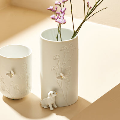 Räder Vase Hund sitzend