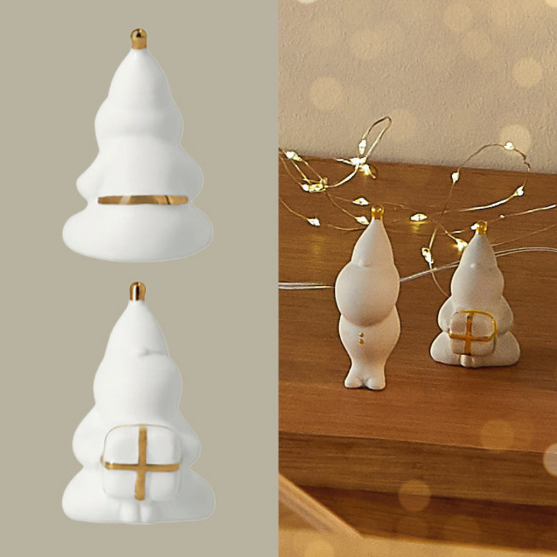 Räder Porzellanfigur Santa packt Geschenke