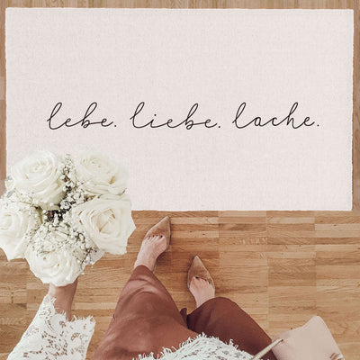 Eulenschnitt Fußmatte lebe liebe lache cremefarben
